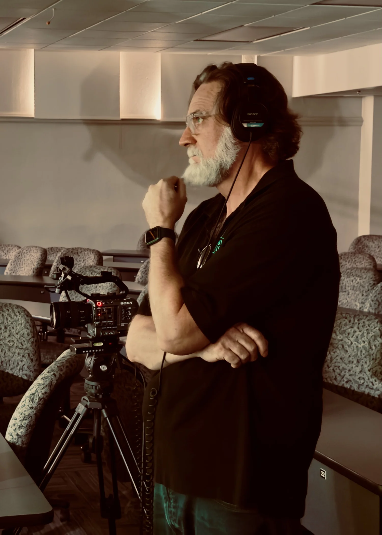 Bill Streeter filming with a Sony camera at an event