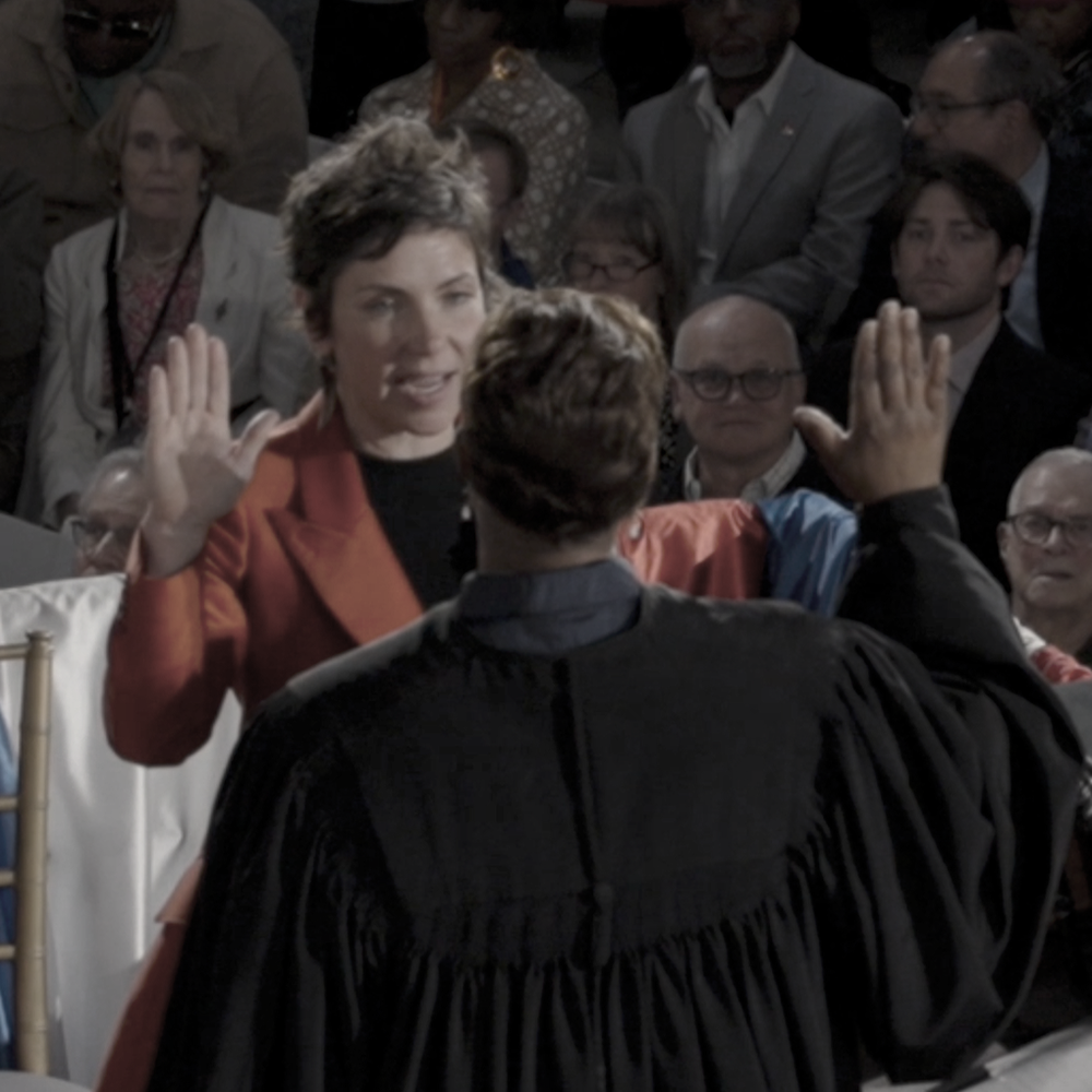Cara Spencer taking the oath of office at a civic ceremony